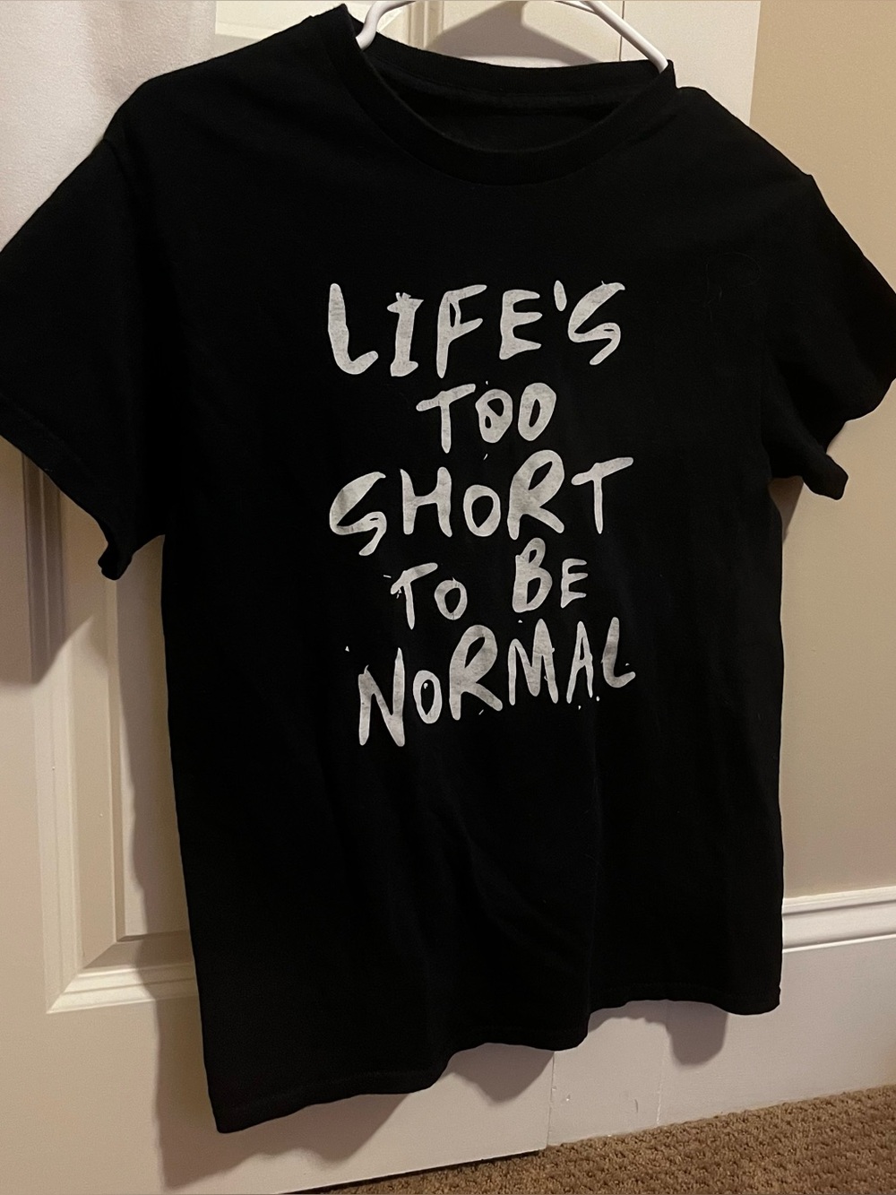 Spencer’s ‘life’s too short to be normal’ black top